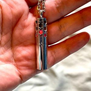 Essential oil necklace.